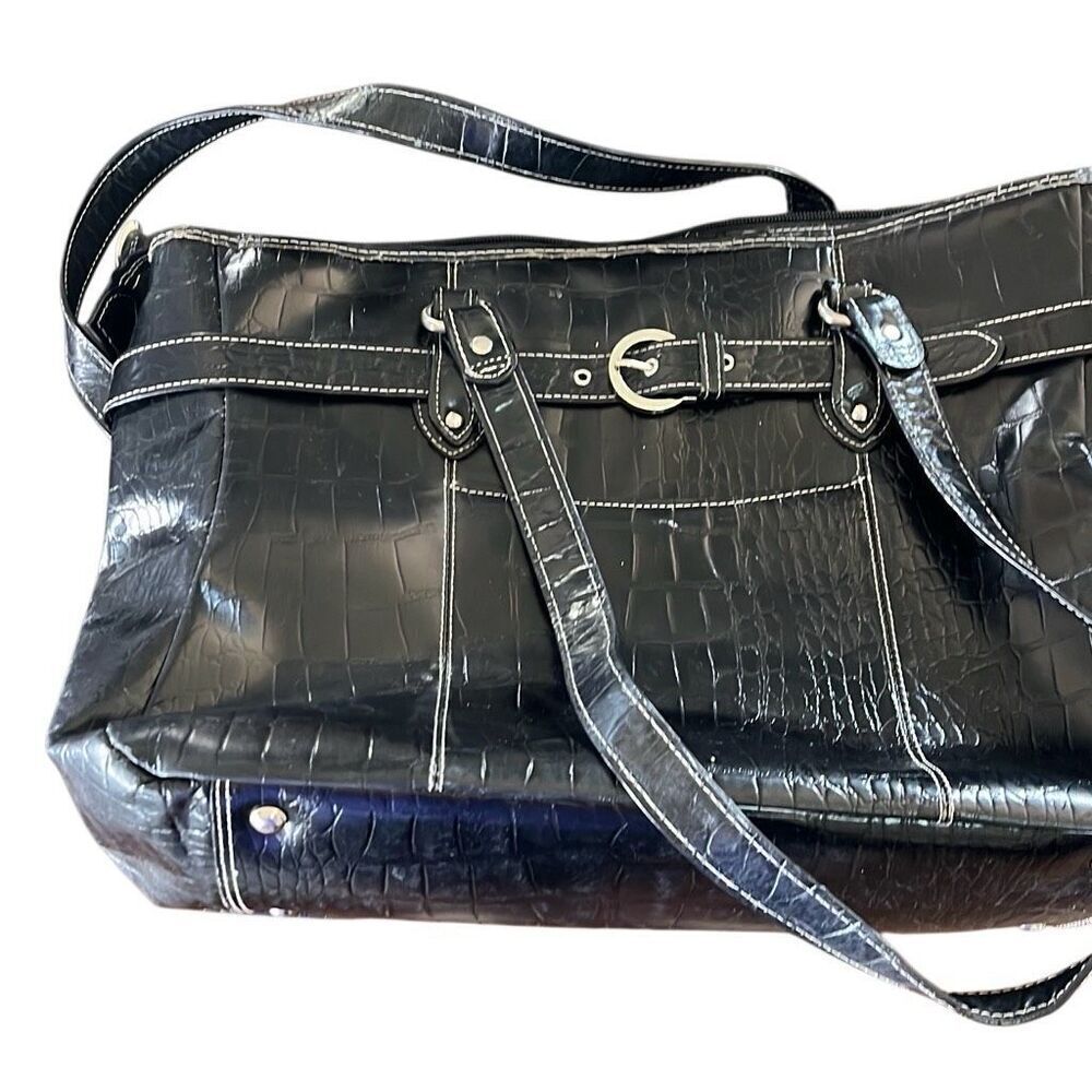 No brand well loved computer bag.